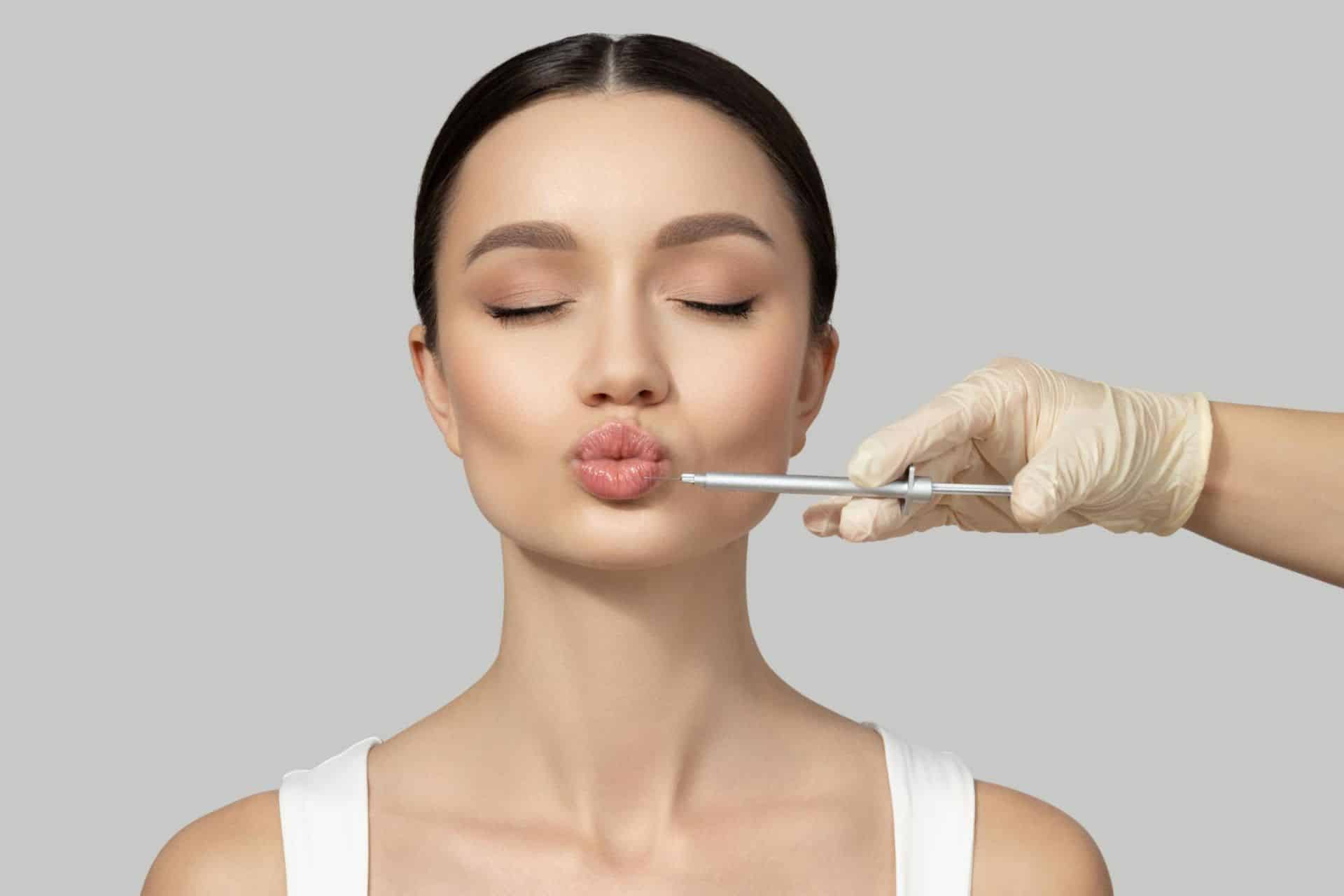 Woman undergoing lip volumisation